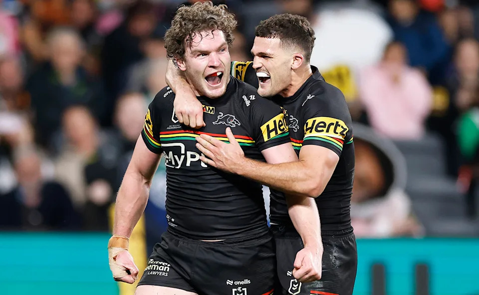 Liam Martin and Nathan Cleary in action for the Panthers.