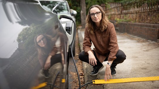 Electrification and EV advocate Sarah Aubrey with her authorised cable cover.
