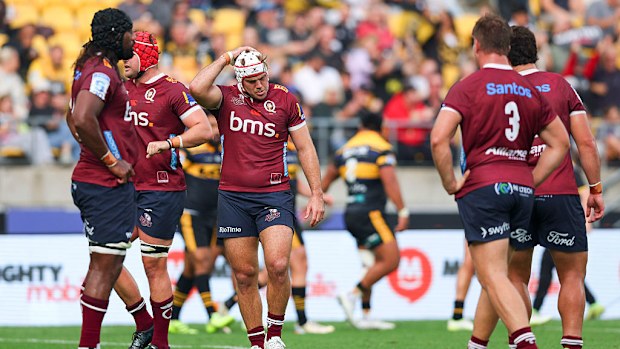Fraser McReight of the Reds reacts after a Hurricanes try in Wellington.