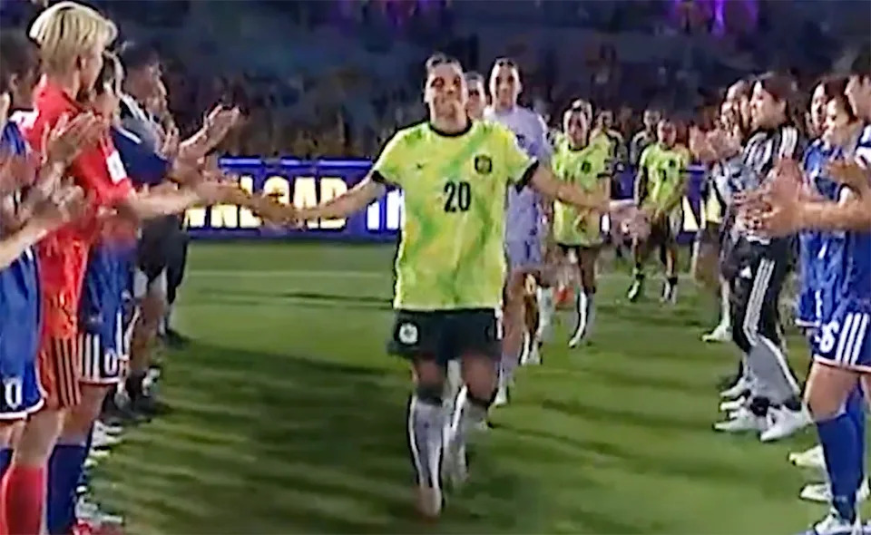 The Japanese team, pictured here forming a guard of honour for the Matildas.