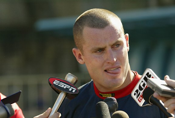 Ricky Stuart and Chris Walker face the media in 2003.