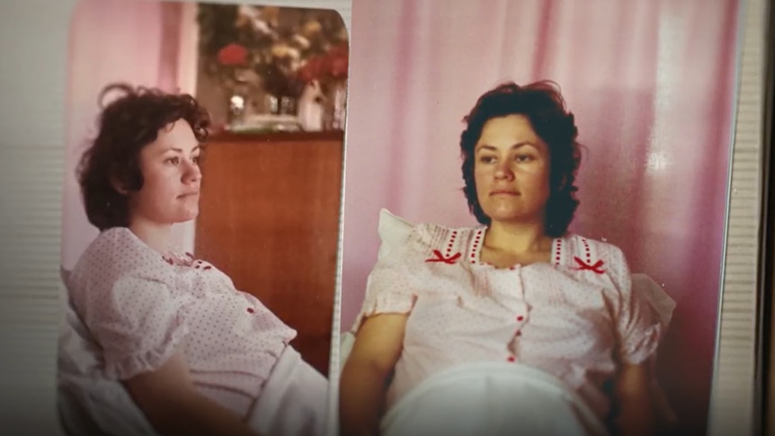 A woman wears a pink nightgown with small bows on each shoulder. She looks blank into distance, visibly recently given birth