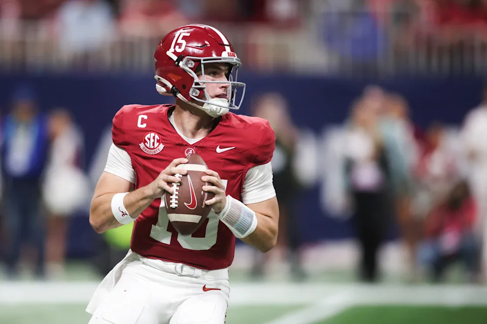 Alabama Crimson Tide quarterback Ty Simpson (15) looks to pass in the game against the Georgia Bulldogs during the 2025 SEC Championship game Brett Davis-Imagn Images