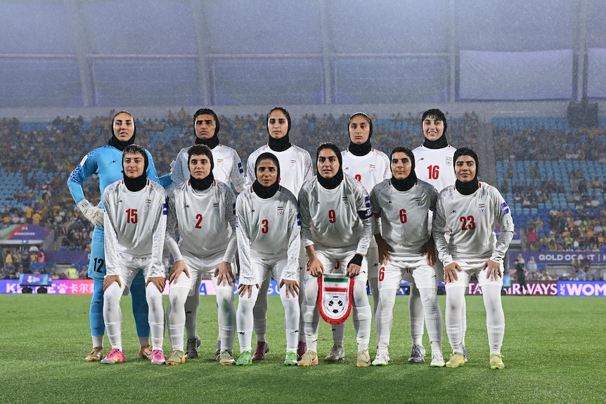 A team photo of the Iranian women's football team before a game