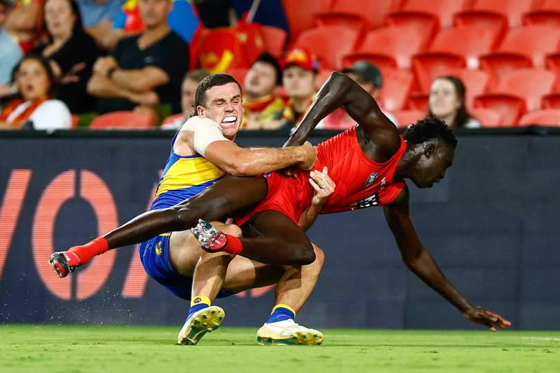 Jake Waterman tackles Mac Andrew.