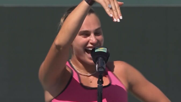 Aryna Sabalenka flashes her engagement ring.