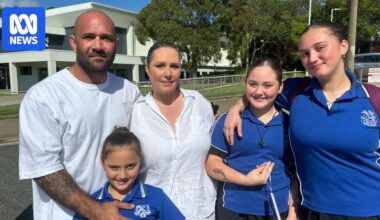 Parents rally outside Queensland high school to demand action against bullying