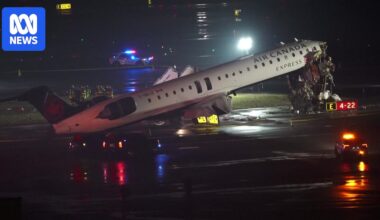 Two dead after Air Canada jet collides with fire truck at New York's LaGuardia Airport