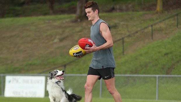 Bayley Fritsch and one of his dogs.