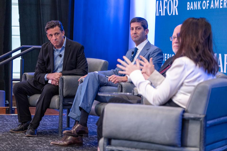 WASHINGTON, DC - APRIL 18: Jon Hilsenrath, Author, chats with Adam Posen, President, Peterson Institute, Kevin Warsh, Former Member, Federal Reserve Board of Governors; and Karen Karniol-Tambour, Co-CIO, Bridgewater at The Semafor 2024 World Economy Summit on April 18, 2024 in Washington, DC. (Photo by Tasos Katopodis/Getty Images for Semafor)