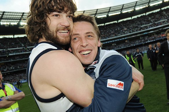 Max Rooke and former Cats coach Mark Thompson after the 2009 AFL grand final.