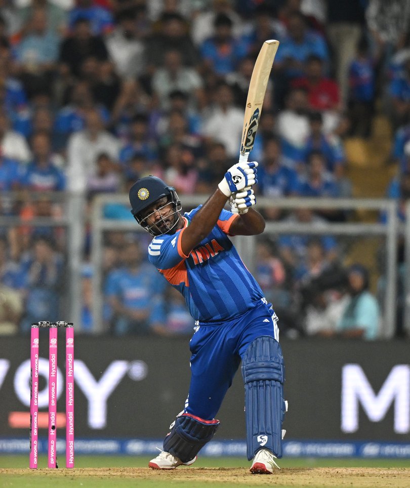 Sanju Samson of India hits out for six runs.