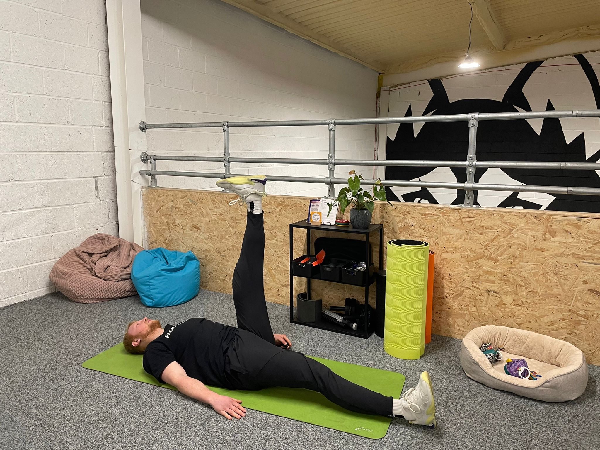 The leg lift is demonstrated by The Independent’s senior fitness writer Harry Bullmore