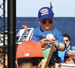A young spring training fan at Clover Park. Photo by Helene Haessler