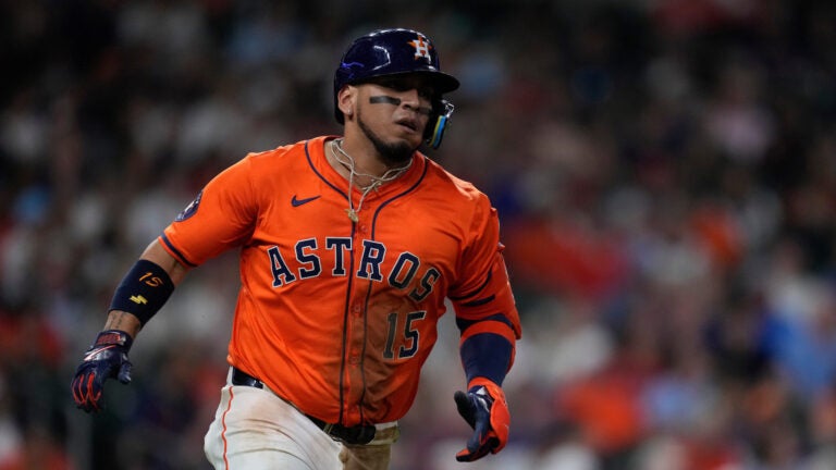 Houston Astros' Isaac Paredes runs to first after hitting a single during the seventh inning of a baseball game against the Texas Rangers, July 11, 2025, in Houston.