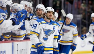 St. Louis Blues center Robert Thomas reacts after scoring an empty-net goal during the third period of an NHL hockey game against the Minnesota Wild, Sunday, March 1, 2026, in St. Paul, Minn.