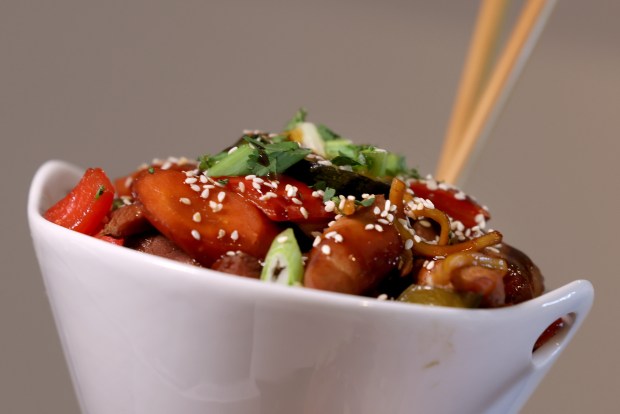 Street Wok, wok-fried chicken and vegetable Lo Mein in sweet and tangy sauce, on display, as the Chicago White Sox hold a media preview to showcase new food and beverage highlights at Rate Field, Wednesday, March 18, 2026. (Antonio Perez/Chicago Tribune)