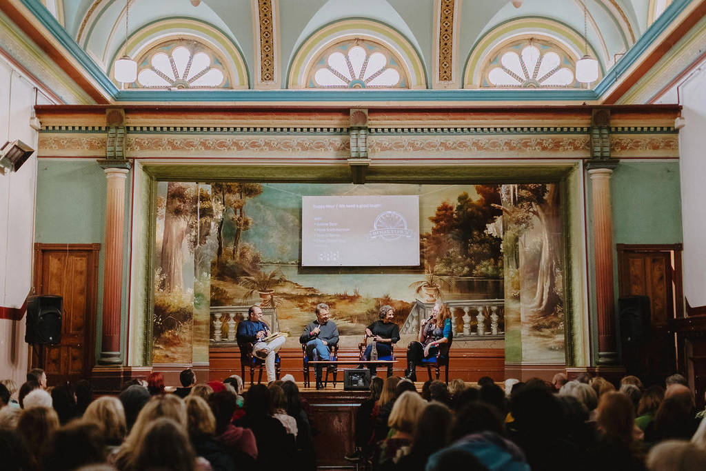 a panel of four experts on stage in a historic venue at Clunes Booktown Festival