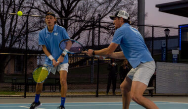 Antoine Mayoral (left) and Houston Jacques (right) return a volley at the net at the MTSU outdoor tennis complex on Feb. 20, 2026.