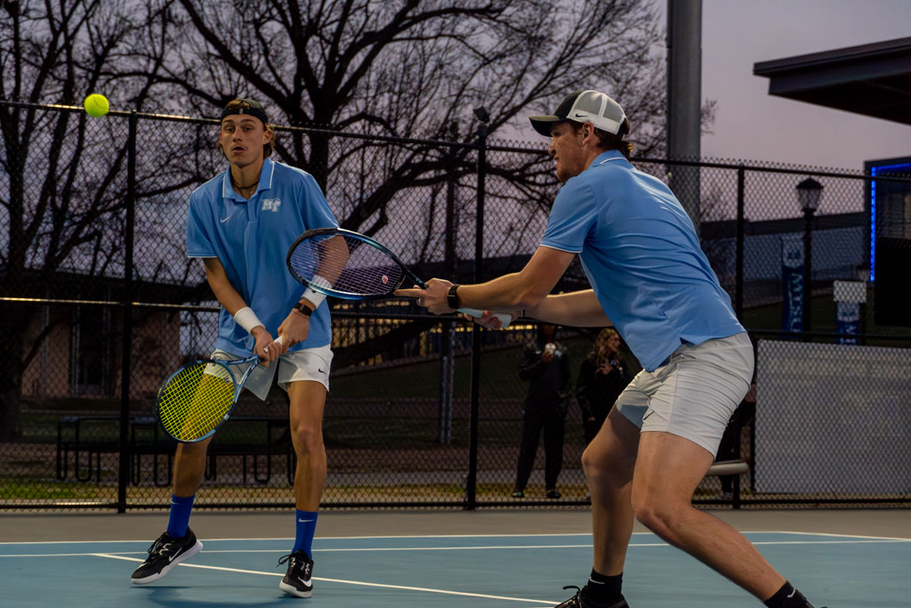 Antoine Mayoral (left) and Houston Jacques (right) return a volley at the net at the MTSU outdoor tennis complex on Feb. 20, 2026.