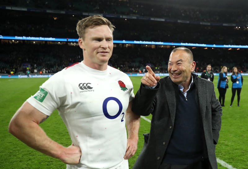 Eddie Jones, right, and Chris Ashton celebrate after England's 12-11 victory over South Africa in November 2018 at Twickenham. Photograph: David Rogers/Getty