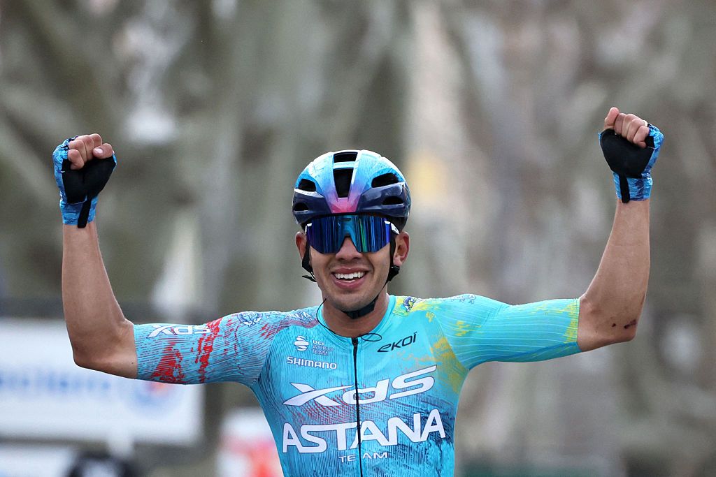 XDS Astana Team's Colombian rider Harold Tejada celebrates as he crosses the finish line to win the 6th stage of the Paris-Nice cycling race, 179.3 km between Barbentane and Apt, on March 13, 2026. (Photo by Anne-Christine POUJOULAT / AFP)