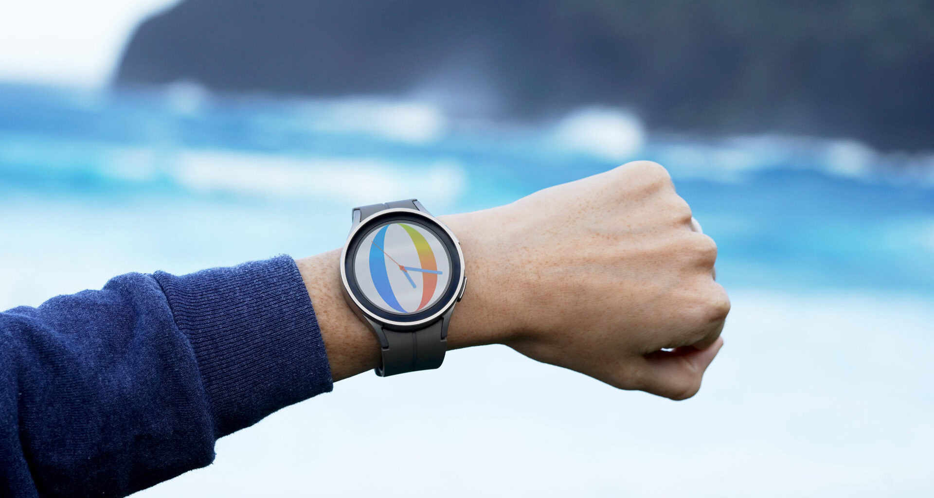 A Galaxy Watch 5 Pro displays Ball watch face.