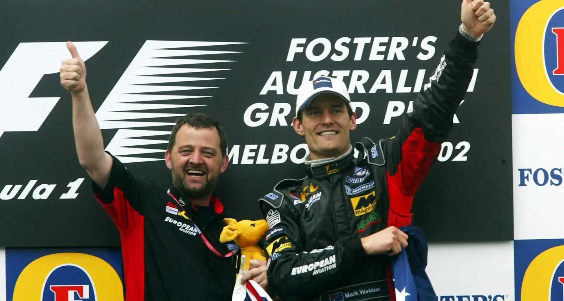 Ferrari's British driver Lewis Hamilton (front L) leads the pack at the start of the sprint race of