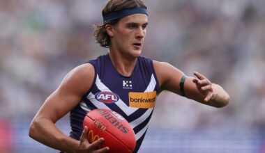 GEELONG, AUSTRALIA - MARCH 15: Murphy Reid of the Dockers runs with the ball during the round one AFL match between Geelong Cats and Fremantle Dockers at GMHBA Stadium, on March 15, 2025, in Geelong, Australia. (Photo by Daniel Pockett/Getty Images)