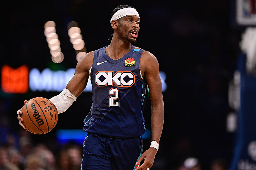 Shai Gilgeous-Alexander dribbles during an Oklahoma City Thunder game, featured in today’s NBA player prop and longshot parlays.