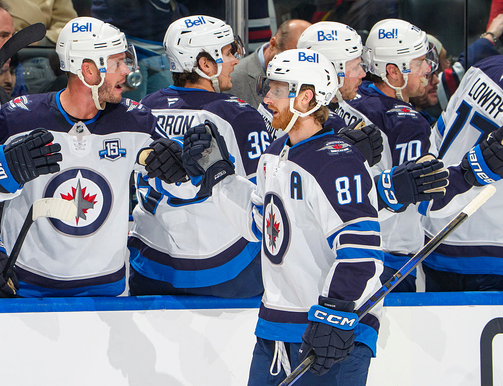 VANCOUVER, CANADA - FEBRUARY 25: Kyle Connor #81 of the Winnipeg Jets celebrates his goal with teammates during the first period of their NHL game against the Vancouver Canucks at Rogers Arena on February 25, 2026 in Vancouver, British Columbia, Canada. (Photo by Jeff Vinnick/NHLI via Getty Images)