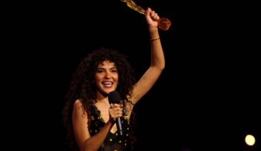 Olivia Dean preaches ‘the art of loving’ at Brit Awards ceremony plagued by censorship and dodgy jokes