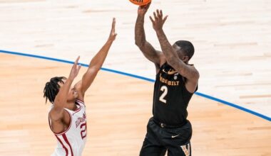 Duke Miles takes a jump shot over an Arkansas defender, as photographed o March 15, 2026. (Photo courtesy of Vanderbilt Athletics)