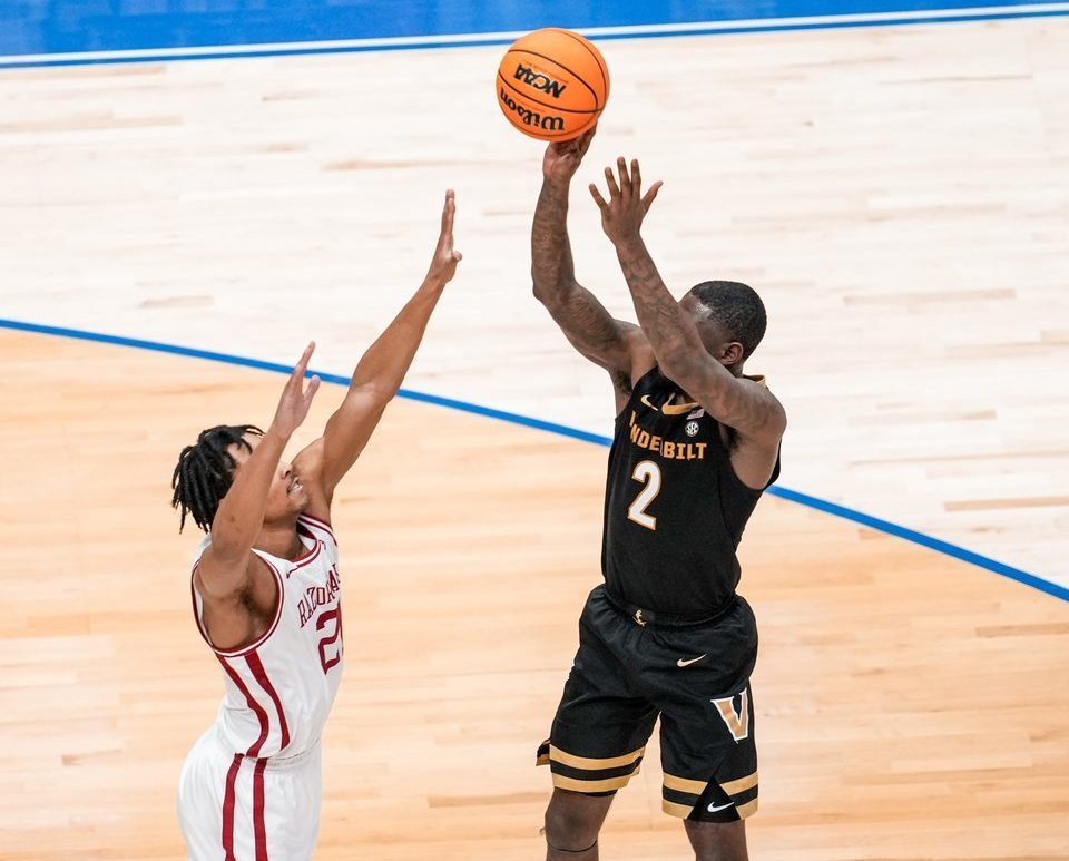Duke Miles takes a jump shot over an Arkansas defender, as photographed o March 15, 2026. (Photo courtesy of Vanderbilt Athletics)