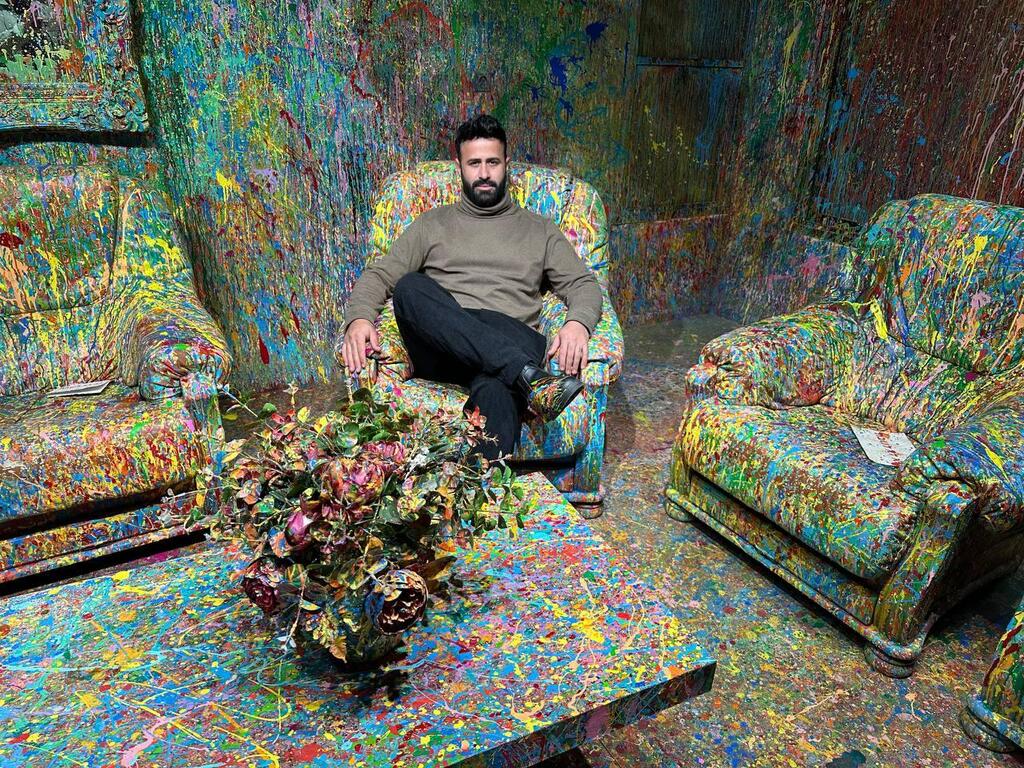 Artist Sam Halaby sits inside his House of Colors in Daliyat al-Karmel, northern Israel 