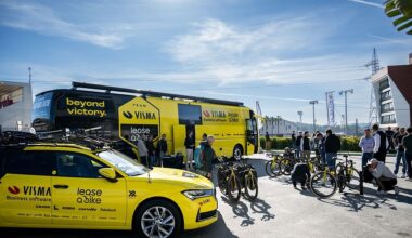 Visma-Lease a Bike team car and bus at a team presentation in January 2026