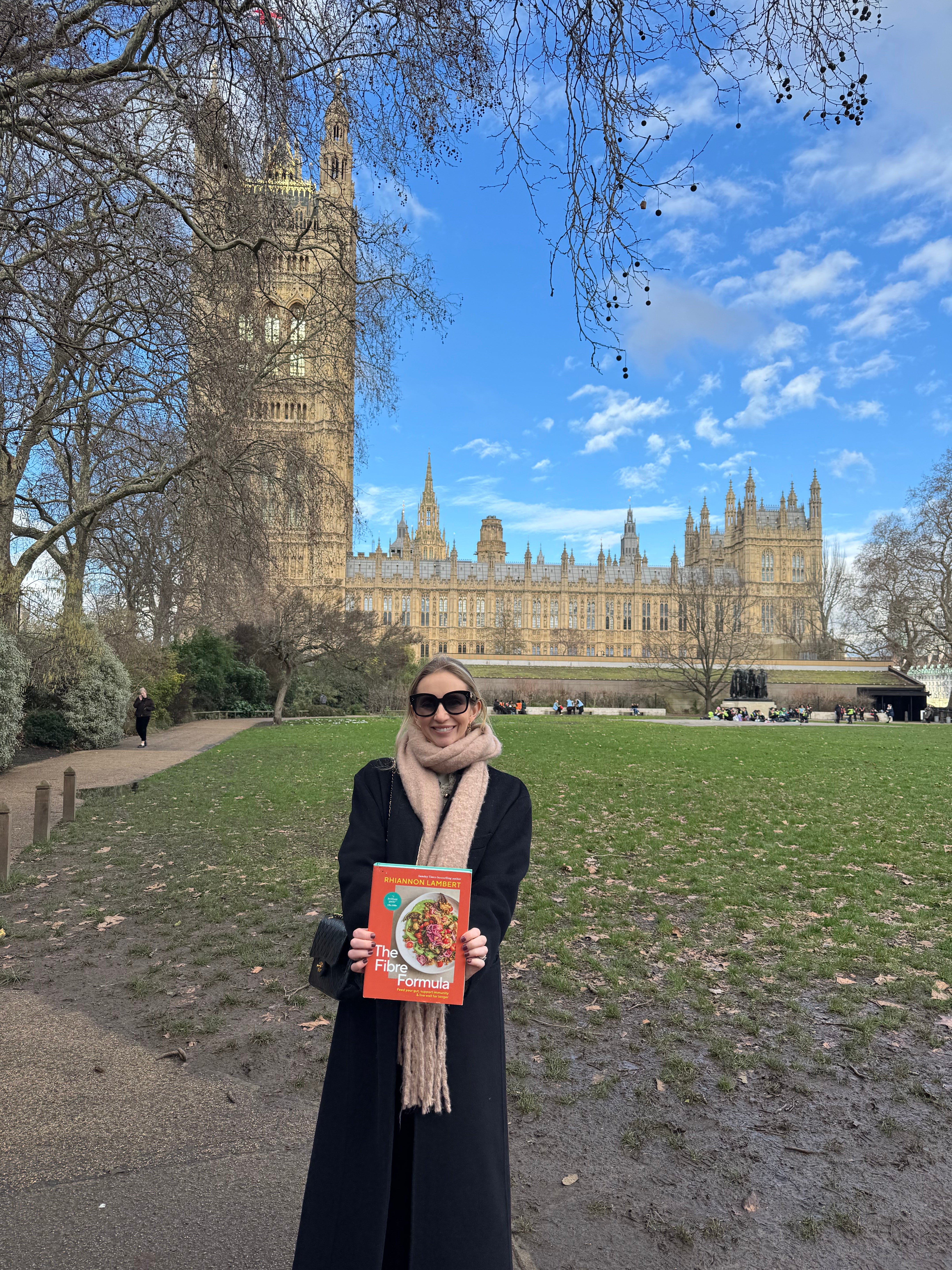 Rhiannon Lambert with her book, The Fibre Formula, at parliament