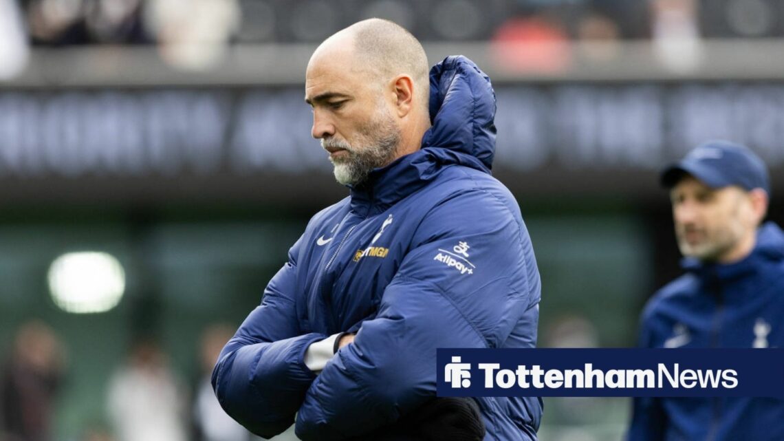 Igor Tudor looking down in a Tottenham jacket