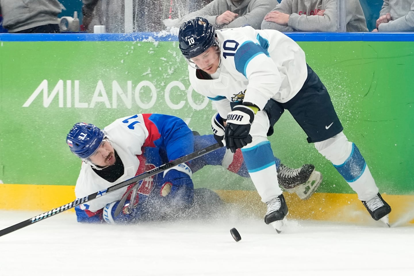 Finland's Henri Jokiharju (right) hoped to springboard off the Olympic experience and into a more vital role with the Bruins.