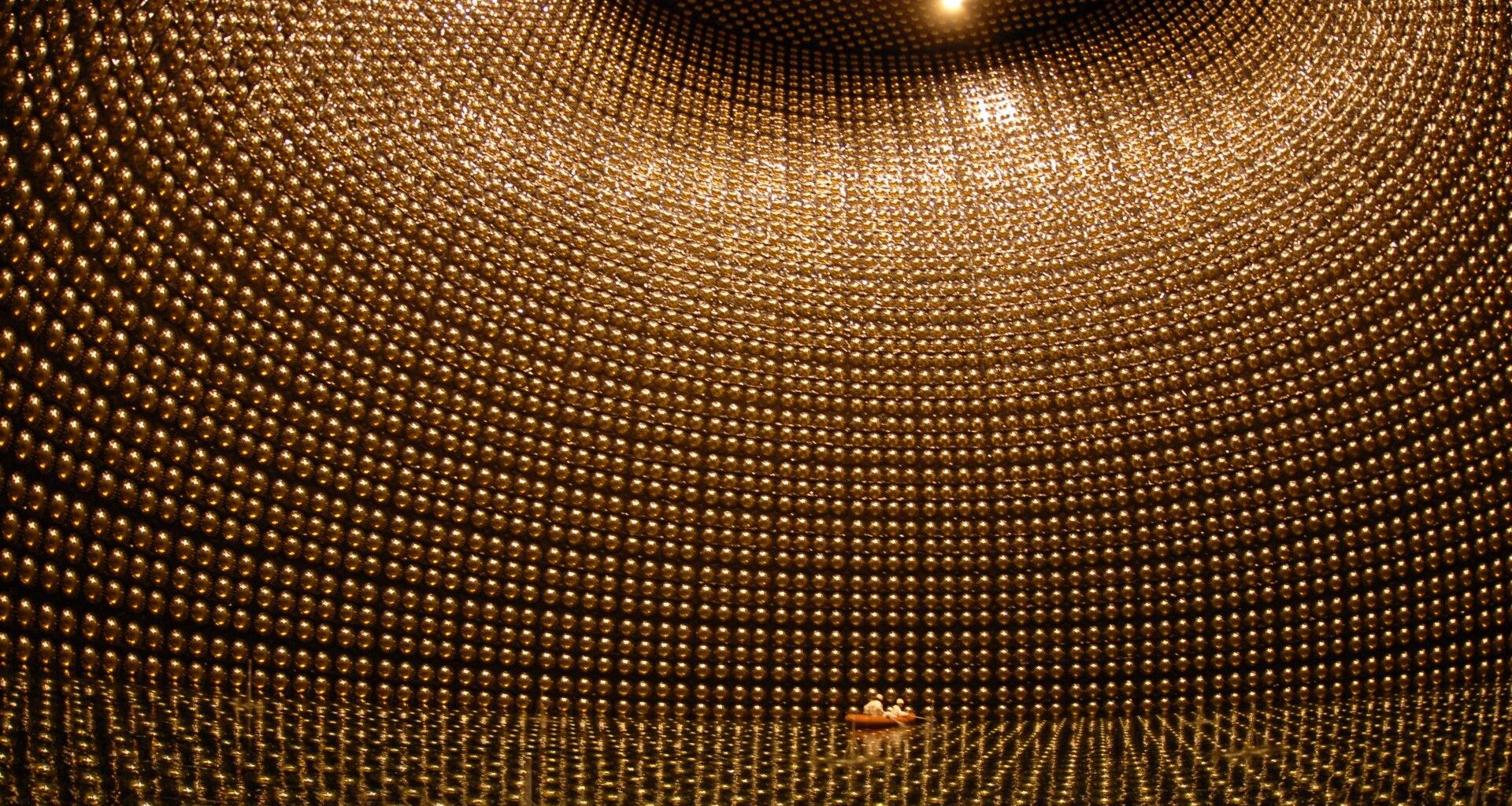 a massive underground chamber lined wall-to-wall with golden orbs
