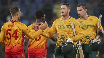 New Delhi: South African players shake hands with Zimbabwe players after winning in the ICC Men's T20 World Cup 2026 cricket match between Zimbabwe and South Africa, at Arun Jaitley Stadium in New Delhi, Sunday, Mar. 1, 2026. (PTI Photo/Karma Bhutia)(PTI03_01_2026_000612A) (PTI)