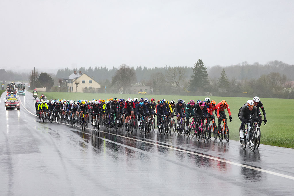 The pack rides during the 4th stage of the Paris-Nice cycling race, 195 km between Bourges and Uchon, on March 11, 2026. (Photo by Anne-Christine POUJOULAT / AFP)