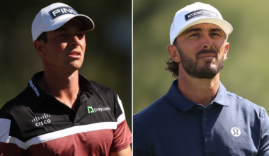 Viktor Hovland and Max Homa walk down the fairway
