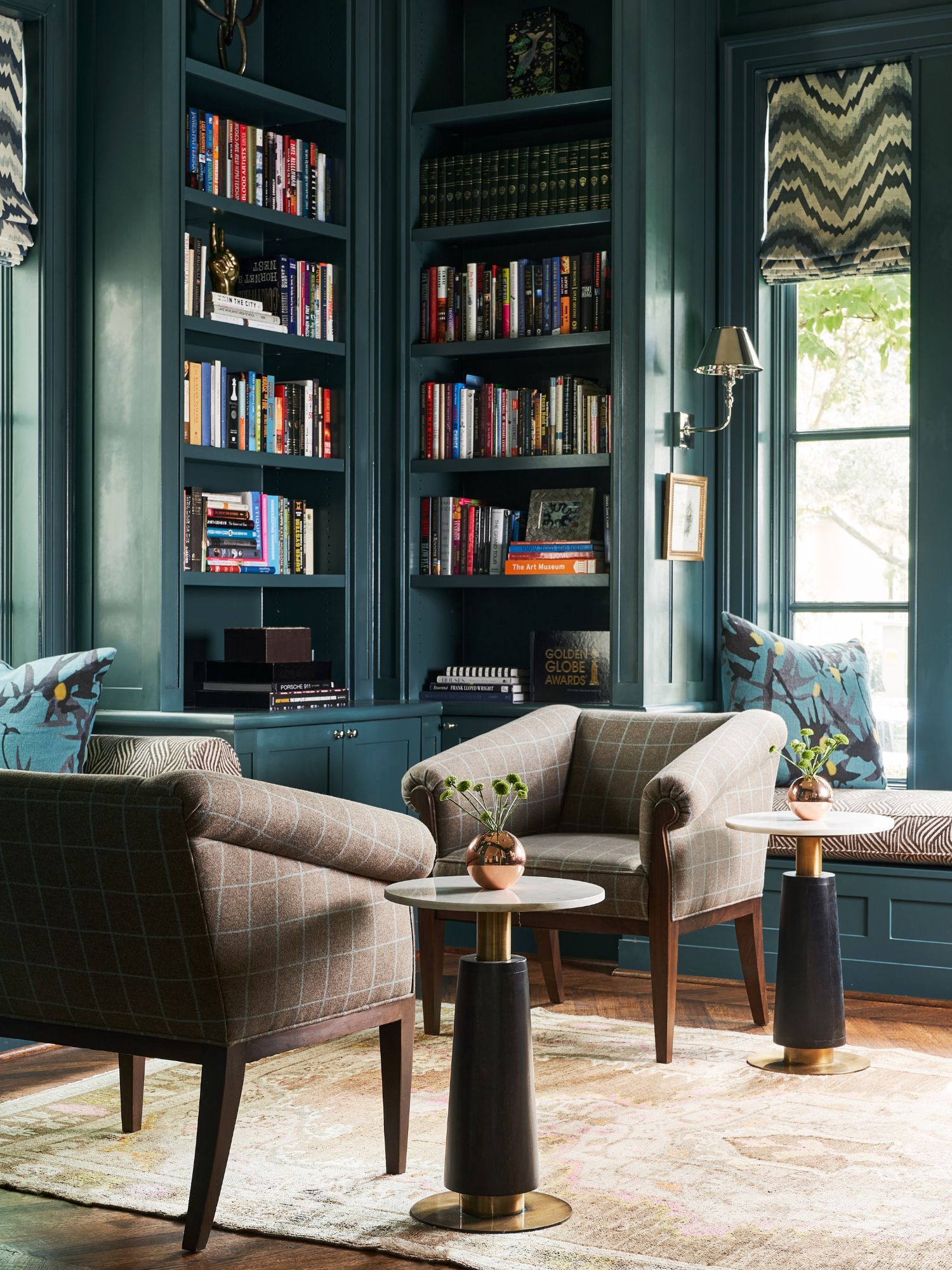 Analog room with comfortable seating and bookshelves