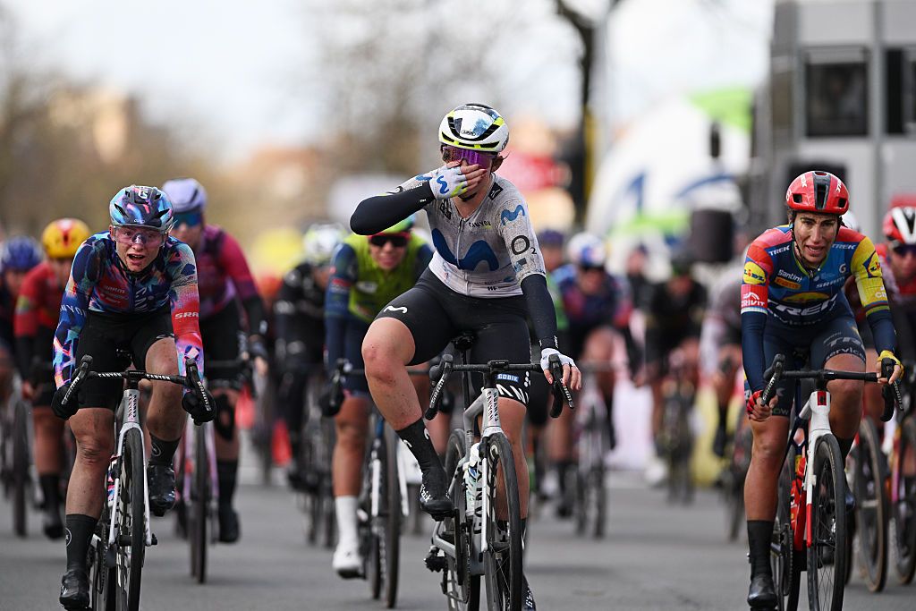 Lloyd covers her face in disbelief after winning the sprint