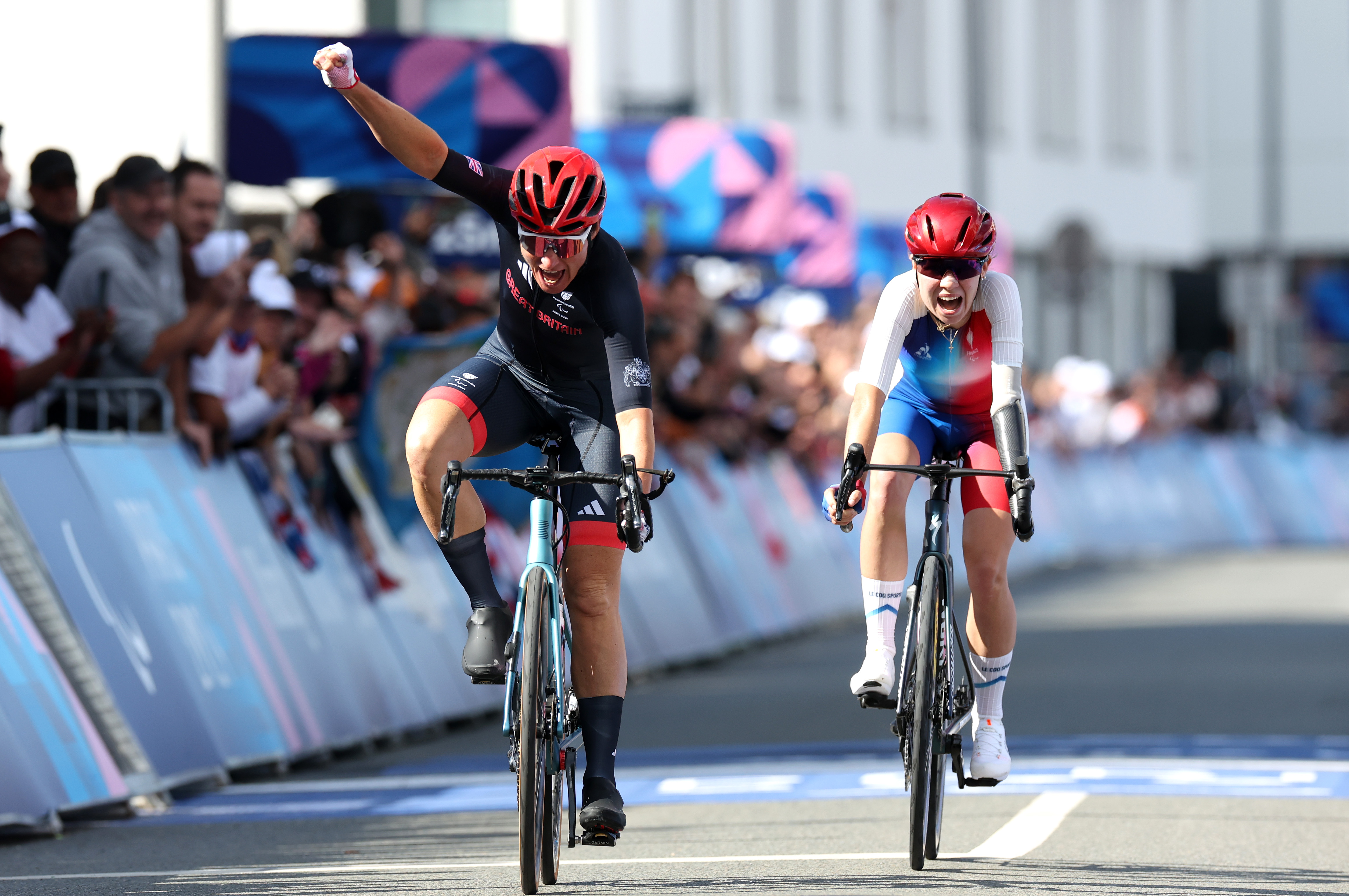 PARIS, FRANCE - SEPTEMBER 06: Sarah Storey of Team Great Britain and Heidi Gaugain of Team France celebrate taking Gold and Silver in the Women&amp;apos;s C4-5 Road Race on day nine of the Paris 2024 Summer Paralympic Games at on September 06, 2024 in Paris, France. (Photo by Michael Steele/Getty Images)