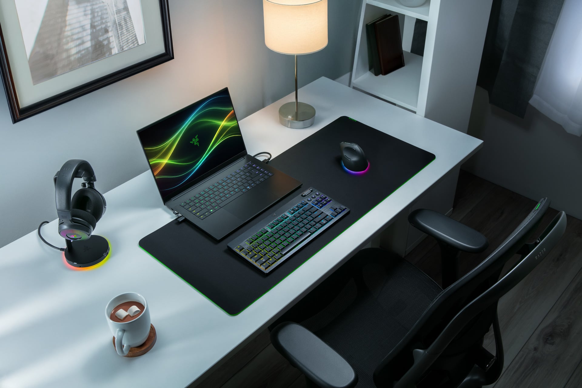 Razer Blade 16 (2026) surrounded by PC peripherals