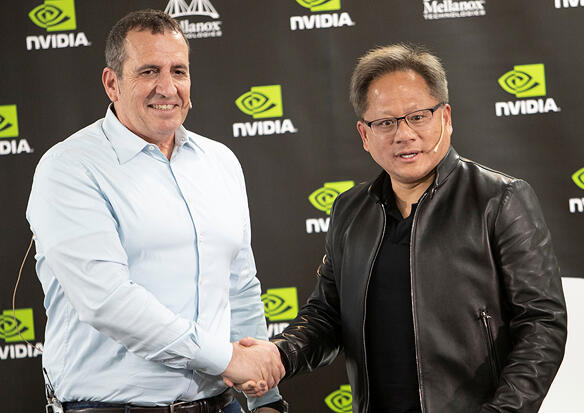 Nvidia CEO Jensen Huang and Mellanox CEO Eyal Waldman (Photo: Gil Nehushtan) מימין: מנכ"ל אנבידיה, ג'נסן הואנג, ומנכ"ל מלאנוקס, איל וולדמן. שידרו אופטימיות