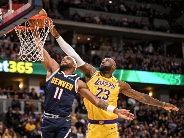 LeBron James (23) of the Los Angeles Lakers runs down Bruce Brown (11) of the Denver Nuggets to force a miss during the second quarter at Ball Arena in Denver on Thursday, March 5, 2026. (Photo by AAron Ontiveroz/The Denver Post)