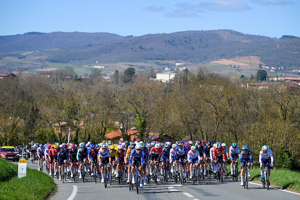 The pack of riders pictured in action during the fifth stage of 84th edition of the Paris-Nice cycling race, a race from Cormoranche-sur-Saone to Colombier-le-Vieux (205,4km), on Thursday 12 March 2026. BELGA PHOTO DAVID PINTENS (Photo by DAVID PINTENS / BELGA MAG / Belga via AFP)